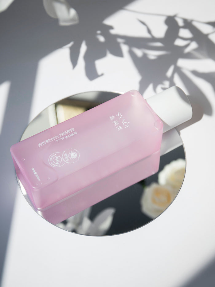 Temporary stock placeholder — pink body wash bottle on mirror (via Pexels)